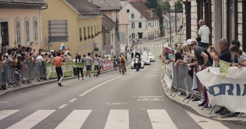 NOVO MESTO, SLOVENIA - JUNE 13 2021: Breakaway cycling group at Tour
