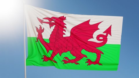 Flag of Wales waving in the wind. Wales is part of United Kingdom, Great Britain