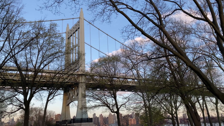 Triborough Bridge as pandemic shutdowns ease and the economy reopens, on Monday, April 19, 2021 in New York City, NY, U.S. Royalty-Free Stock Footage #1074401873