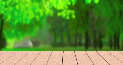 Empty wooden table with blurred city park on background Perspective wood and bokeh light background product display template Empty wooden table template on top with nature green background moving