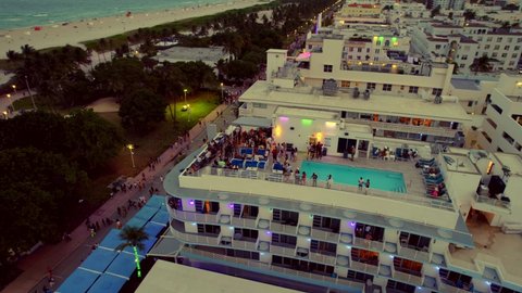 Miami Beach, FL, USA - June 12, 2021: Aerial Miami Beach rooftop pool party Ocean Drive at The Palace 5k