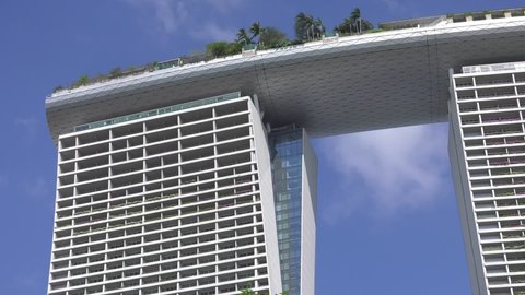 Singapore , Singapore - 03 03 2019: Looking Up At Marina Bay Sands Hotel Against Blue Skies In Singapore. Low Angle, Locked Off