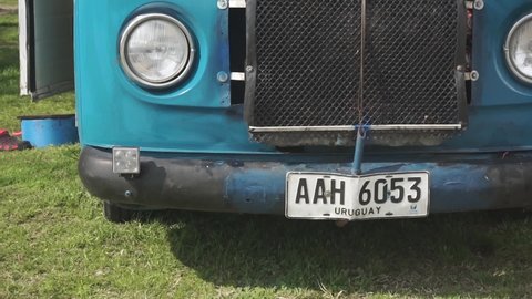 Montevideo , Uruguay - 08 22 2019: Close up of front of vintage camper van. Gimbal shot.