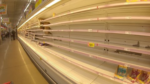 Corpus Christi , Texas , United States - 02 19 2021: Nearly empty shelves of packaged meats after Winter Storm Uri; Dissrupted food supply chain