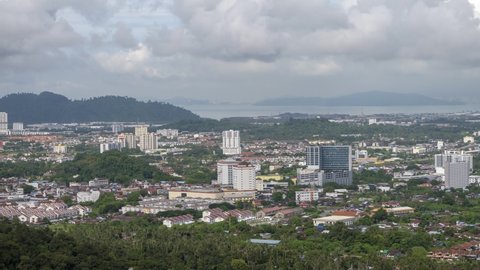 Bukit Mertajam, Penang, Malaysia - Sep 11 2020: Timelapse view moving cloud and shadow over Bukit Mertajam town