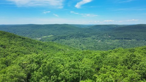 Aerial drone footage of Shawangunk Mountains during summer in New York’s Hudson Valley. The Shawangunks are a sub-range of the Appalachian Mountains on the east coast of United States