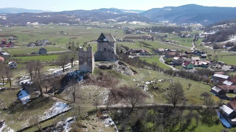 Brinje , Lika , Croatia - 04 16 2021: An areal approach to ruins of a castle on the hill