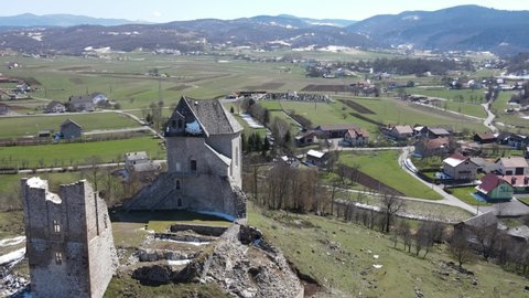 Brinje , Lika , Croatia - 04 16 2021: Panoramic areal view of ruins on top of the hill