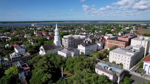 Charleston SC, Charleston South Carolina, Wide Shot Aerial over Saint Michael's Church with the Battery in Background