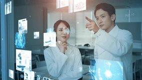 Young asian doctors watching medical data. Medical technology concept. Medtech. - Powered by Shutterstock - Get 15% off with code: PIKWIZARD15