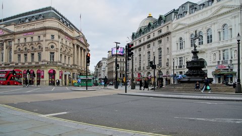 London , England , United Kingdom (UK) - 11 05 2020: Empty tourist attraction and roads in London in Covid-19 Coronavirus lockdown at Piccadilly Circus, with quiet streets in the West End  