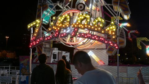 COQUITLAM , British Columbia , Canada - 04 08 2016: Coquitlam, BC, Canada - April 08, 2016 : People having fun at the West Coast Amusements Carnival with 4k resolution