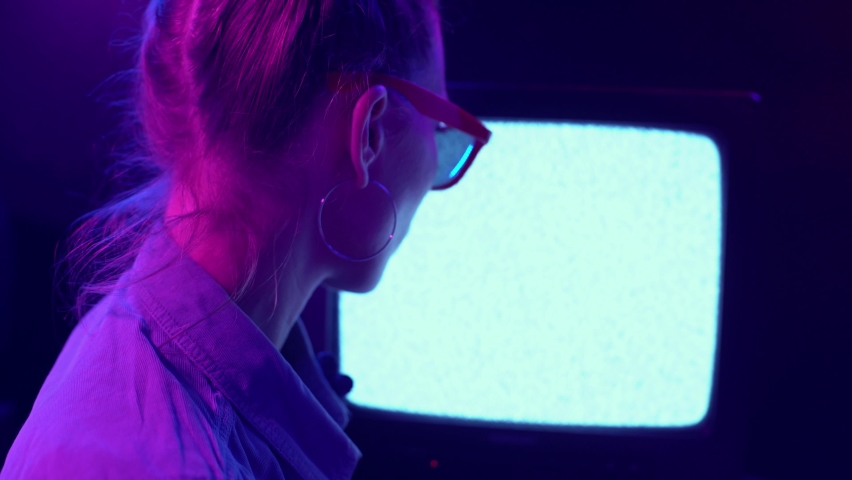 A close view of a woman covering the camera with her hand