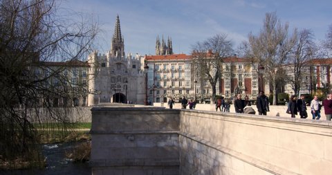 Burgos , Burgos , Spain - 03 02 2019: Arco Santa Maria and Santa Maria Bridge with people walking, Burgos, Spain