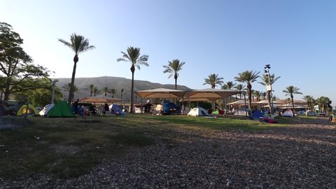 kineret- israel. 18-06-2021. Tents on the shores of the Sea of Galilee on halukim beach near the lifeguard booth