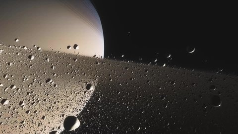 Cinematic animation of Saturn's rings made of rocks, dust and ice. Planet Saturn is a huge planet of the solar system with beautiful rings. 