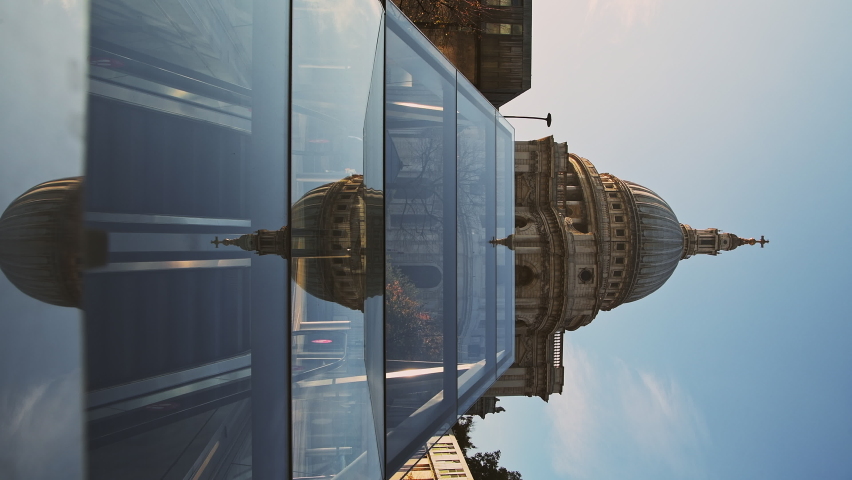 Vertical video of St Pauls Cathedral, a popular London tourist attraction and beautiful famous building on a bright blue sky day, shot in the Coronavirus Covid-19 pandemic Lockdown in England, Europe