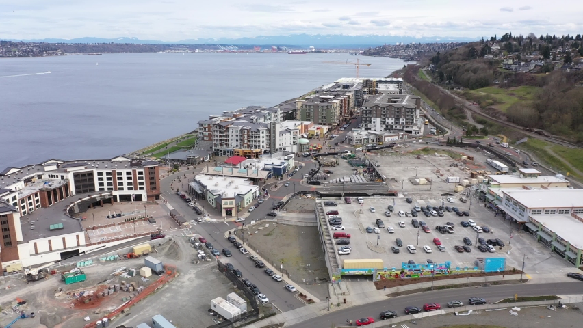 Cinematic aerial drone footage of the new Point Ruston residential and commercial development, the Silver Cloud Hotel located on the waterfront by Point Defiance near Tacoma, Pierce County Washington