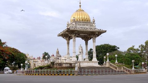 Mysuru, Karnataka, India-June 21 2021;A Grand Memorial for Maharajah 'Krishnaraja wodeyar' in Mysore city and the royal  palace in the far background is a 
perfect travel destination in India in 4K.