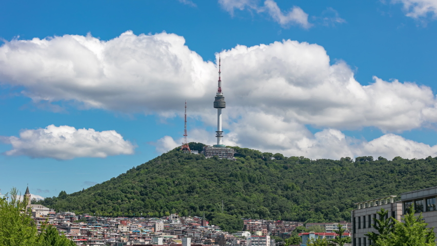 Time Lapse 4K Seoul City Skyline and Seoul Tower with Clouds and blue sky