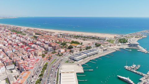 Valencia: Aerial view of famous city in Spain, city beaches (Platja del Cabanyal, Playa de la Malvarrosa and others), clear waters of Mediterranean Sea - landscape panorama of Europe from above