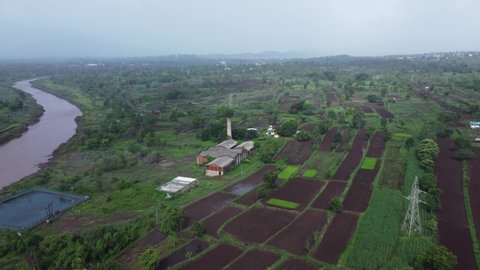 Aerial footage of rural monsoon landscape at Bhor near Pune India.