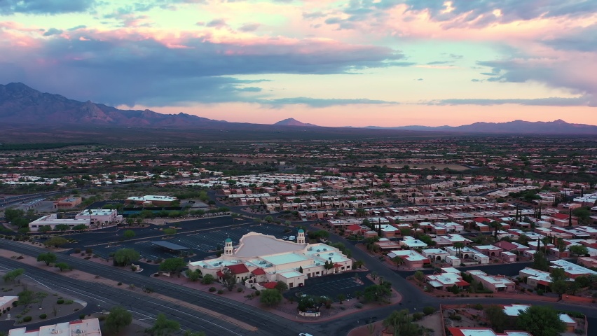 Aerial View Of Green Valley, Arizona With Santa Rita Mountains In Background - drone shot