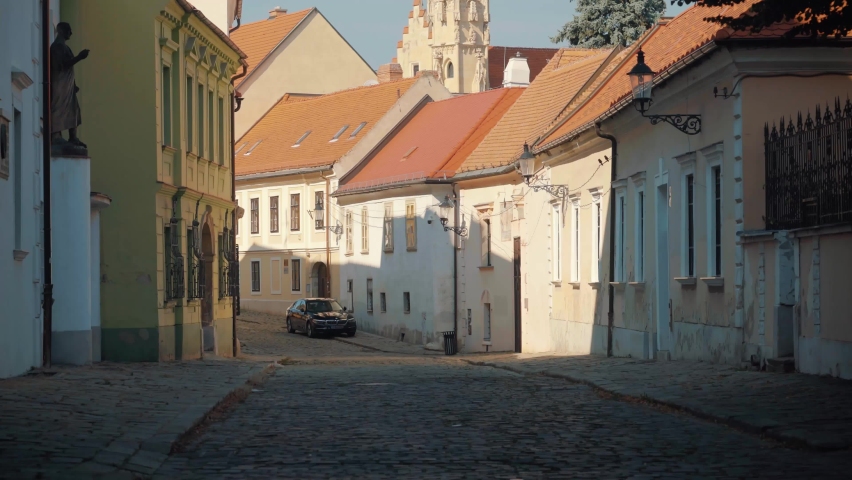 Rustic and quiet historic street in suburban Bratislava with traditional houses