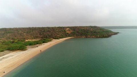Okha , Gujarat , India - 03 31 2021: Drone view of a tropical beach with beautiful sea and waves Redaktionell stockvideo