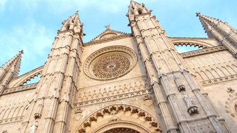 Tilt up shot of facade of Cathedral of St. Mary of Palma, Spain