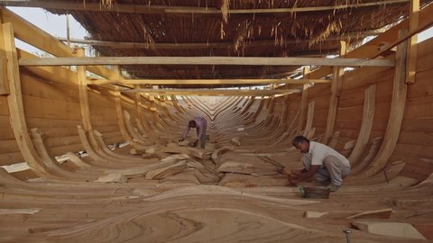 Sur , Oman - 05 03 2018: Artisans Crafting Traditional Dhow Boat In Sur, Oman