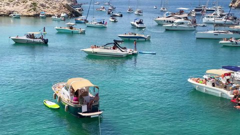 Marseille, France - June 2021 : Boats anchored in the Calanque of Morgiret on the Frioul archipelago in the Mediterranean Sea off Marseille, France