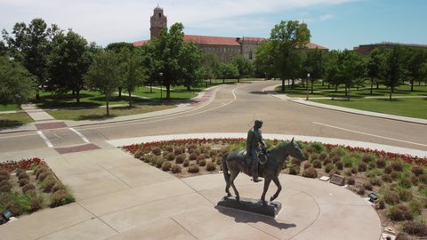 Lubbock, Texas - June 5, 2021: Texas Tech University Will Rogers and Soapsuds statue and Amon G. Carter Plaza