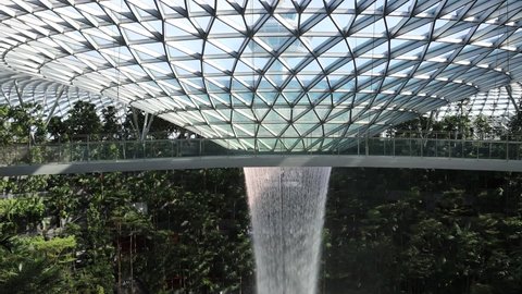 SINGAPORE - 21 JUN 2021.   HSBC Rain Vortex at Jewel Changi Airport   is the world's tallest indoor waterfall. Its waters cascade down 7 storeys or 40 m to Basement 3's water tank and pumped up.