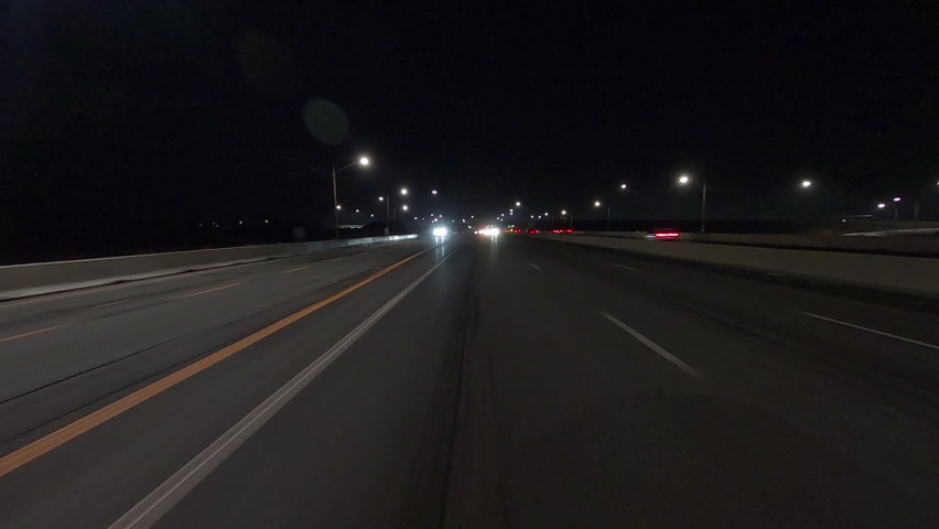 Toronto, Ontario, Canada June 2021 POV driving plate rear view roads and highways on dark night