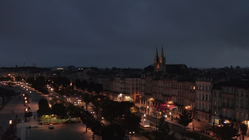 Bordeaux at Night with view of Saint-Louis-des-Chartrons Church, slow establishing Aerial
