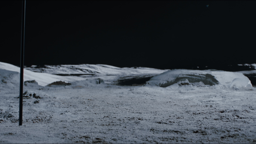 Portrait of Asian lunar astronaut placing a flag pole on the Moon surface. Easy to track and add your flag. Shot with 2x anamorphic lens Royalty-Free Stock Footage #1074659960