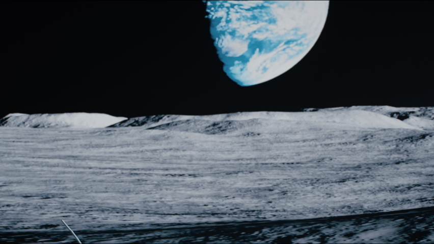 CRANE Back view of lunar astronaut having a beer while resting in a beach chair on Moon surface, enjoying view of Earth. Shot with 2x anamorphic lens Royalty-Free Stock Footage #1074664778
