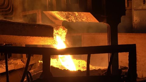 From the blast furnace, the molten liquid metal is poured down the chute into the crucible, steel production.