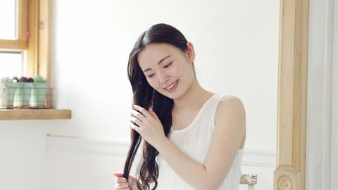 Beauty concept of attractive asian woman. Skin care. Hair care.