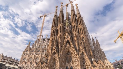 Barcelona, Spain - April 15, 2019: Barcelona Spain time lapse 4K, city skyline timelapse at Sagrada Familia