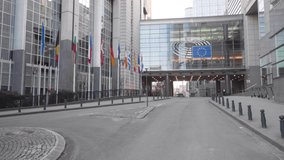 National flags of Europe line the road approaching the entrance of the European Parliament Brussels, Belgium - Powered by Shutterstock - Get 15% off with code: PIKWIZARD15