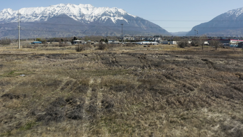 Utah Landscape with Wasatch Mountains in Background - Aerial Flight