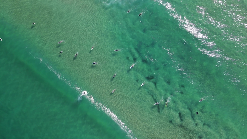 Aerial View Of Surfers Enjoyed Riding Perfect Waves At Bondi Beach - Surf Spot At Bondi, NSW, Australia. Royalty-Free Stock Footage #1074676310