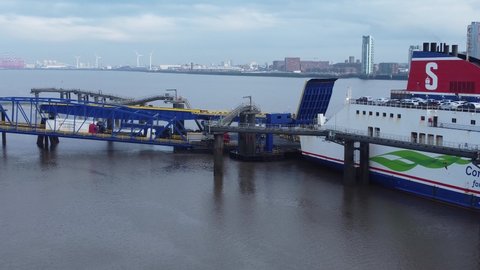 Birkenhead , Liverpool , United Kingdom (UK) - 02 07 2021: Stena Line freight ship vessel logistics cargo shipment from Wirral terminal Liverpool aerial pull back view