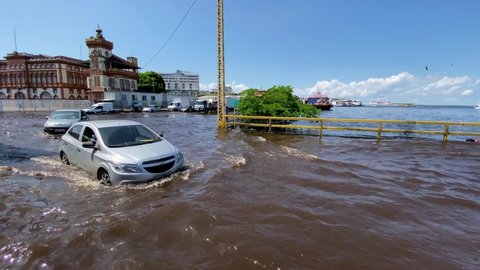 Manaus, AM, Brazil - June 22, 2021: A street is seen completely flooded during the rise of Negro River due to heavy rains and La Nina phenomenon in Amazon region.