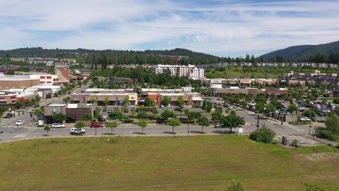 Cinematic drone footage of the Issaquah Highlands commercial and shopping area, in King County Washington, near Seattle and Bellevue in Western Washington