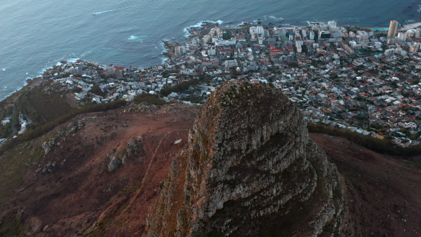 Aerial Top down of Lion's Head packed with people joining the sunset in Cape Town