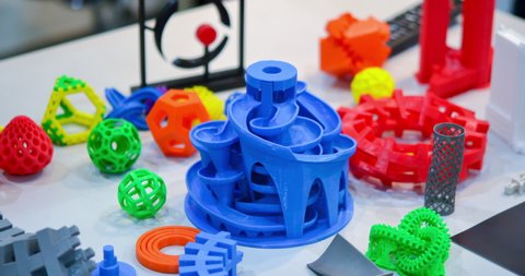 Objects printed by 3d printer. Bright colorful objects printed on a 3d printer