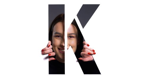 portrait of a girl behind stencil letter K. entire alphabet available.-